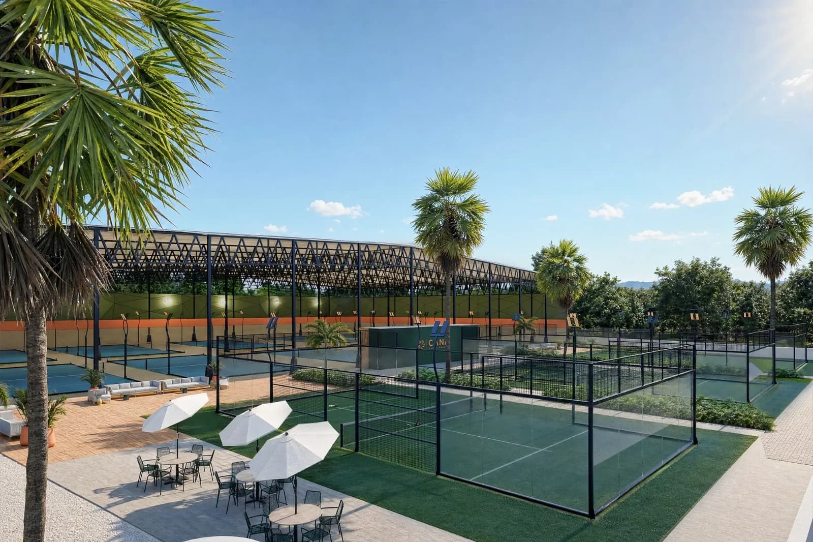 Outdoor padel courts and terrace at Cana Sport Center